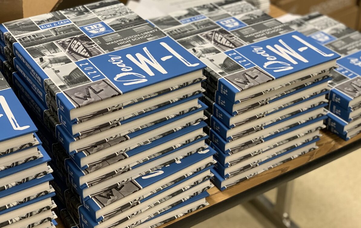 Stack of 2020 - 2021 Yearbooks