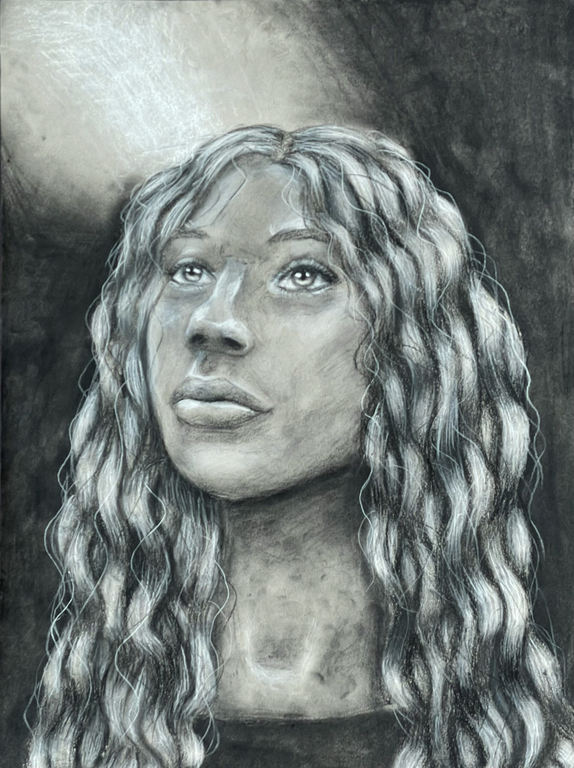 face with light in top corner